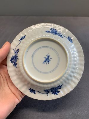 Twelve Chinese blue and white saucers and eight cups, Kangxi/Yongzheng — photo 41