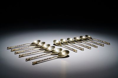 Twelve parcel-gilt silver and niello spoons, Russia, 19/20th C.