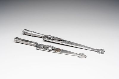Two Argentinian silver gaucho knives with finely engraved design, 19th C.