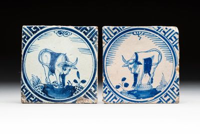 Two blue and white Dutch Delft 'crown' 'oxen' tiles, Rotterdam, early 17th C.