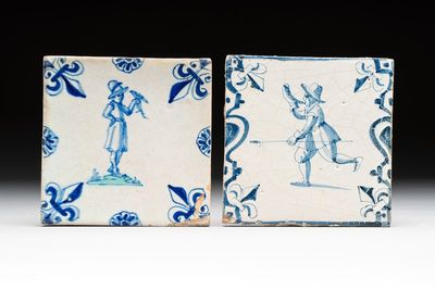 Two blue and white Dutch Delft 'horn blower' and 'falconer on green ground' tiles, 17th C.