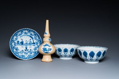 Two Chinese blue and white bowls, a small plate and a café-au-lait ground sprinkler, Kangxi
