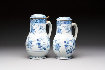 Two Chinese blue and white jugs and cover with floral design, Yongzheng/Qianlong