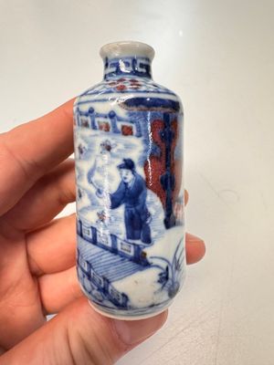 Two Chinese blue, white and copper-red snuff bottles with narrative design — photo 1