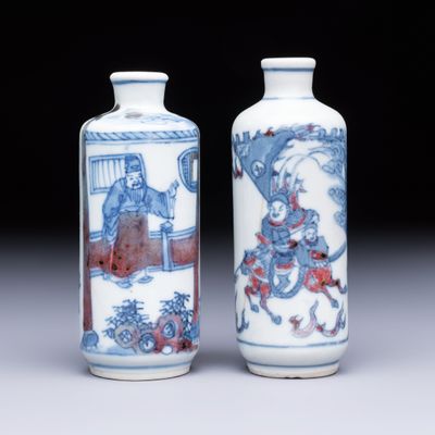 Two Chinese blue, white and copper-red snuff bottles with narrative design, 19th C.
