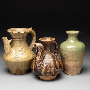 Two Chinese brown-glazed ewers and a celadon-glazed vase, one ewer dated 1571 with a Longqing mark, Qing and later — photo 1