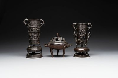 Two Chinese Chinese bronze cylindrical incense stick holders and a covered censer, Yuan/Ming and Qing