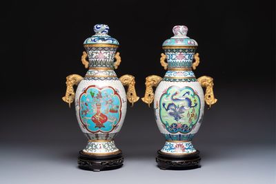 Two Chinese cloisonné vases on wooden stands, 20th C.