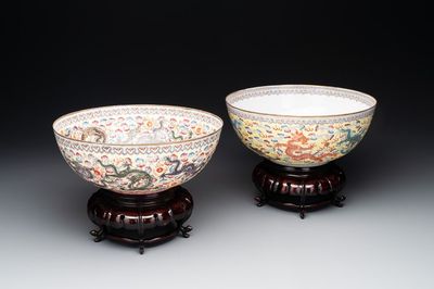 Two Chinese eggshell famille rose 'dragon' bowls on wooden stands, Qianlong mark, 20th C.
