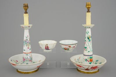 Two Chinese famille rose bowls and two candlesticks, 19th C.