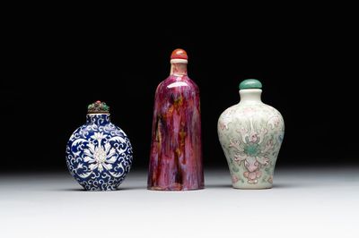 Two Chinese famille rose 'lotus scroll' snuff bottles and a flambé-glazed snuff bottle, 19th C.