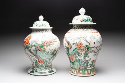 Two Chinese famille verte 'birds and flowers' vases and covers, 19th C.