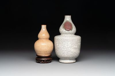 Two Chinese ge-type double-gourd vases, one with a wooden stand, 19/20th C.