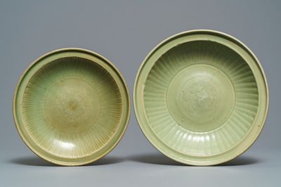Two Chinese Longquan celadon dishes with underglaze design, Ming