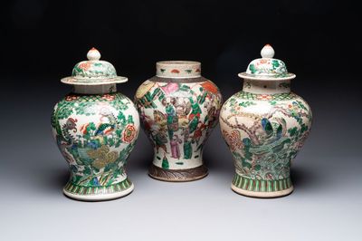Two Chinese Nanking famille verte covered vases and a famille rose vase, 19th C.