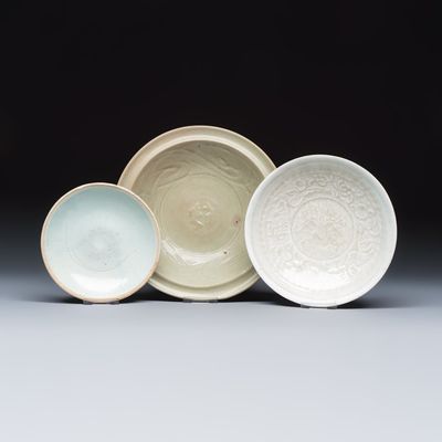 Two Chinese qingbai plates and a Longquan celadon plate, Song and later