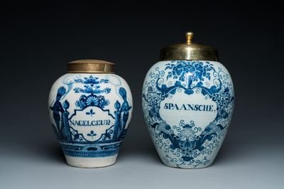 Two Dutch Delft blue and white tobacco jars with brass lids, 18th C.