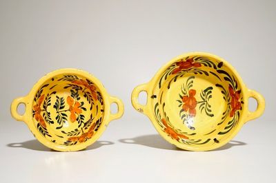 Two Dutch Delft yellow ground porringers, 18th C.