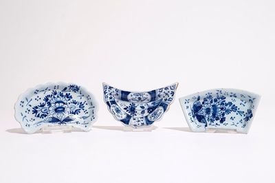 Two English Delft condiment plates and a German Nürnberg example, 18th C.