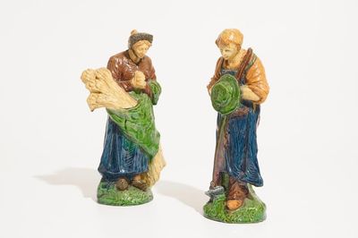 Two Flemish pottery figures from the series of "The 4 seasons", prob. Laigneil workshop, 20th C.