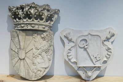 Two plaster casts of Flemish heraldic interest, 19/20th C., Bruges