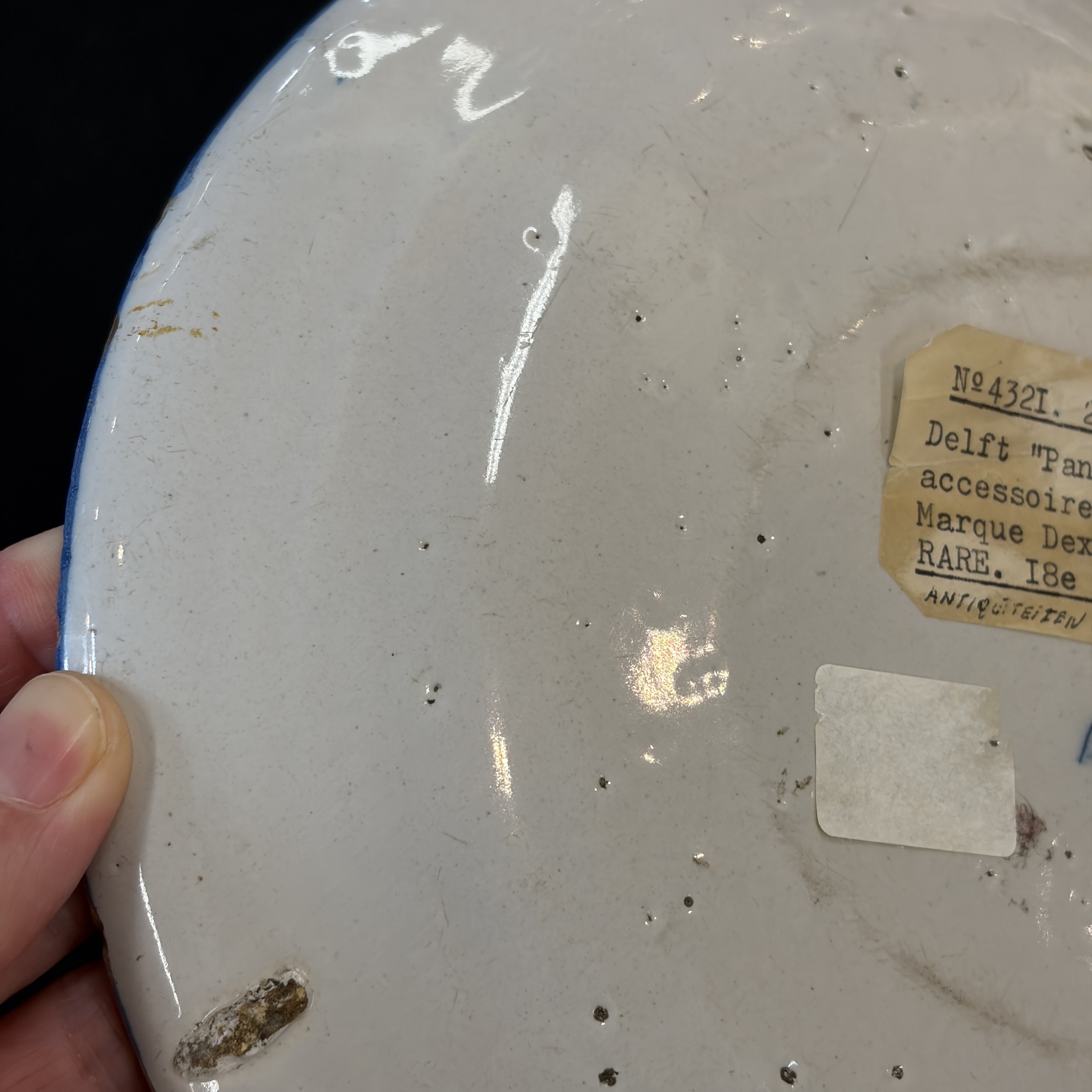     A pair of Dutch Delft blue and white and polychrome ‘Hundred Antiques’ plates — photo 29
