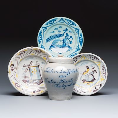Two polychrome Dutch Delft dishes, a blue and white 'Peacock' dish and a tobacco jar, 18/19th C.