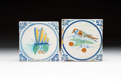 Two polychrome Dutch Delft 'dragonfly' and 'bird' medallion tiles, Haarlem, 17th C.