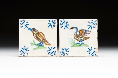 Two polychrome Dutch Delft 'kingfisher' and 'swan' tiles, 17th C.
