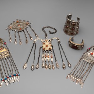 Two silver bracelets, two pendants with carnelian stones, a silver back ornament and a silver capstone, Turkmenistan, 19/20th C. — photo 1