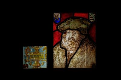 Two stained glass fragments, Flanders or France, one dated 1532