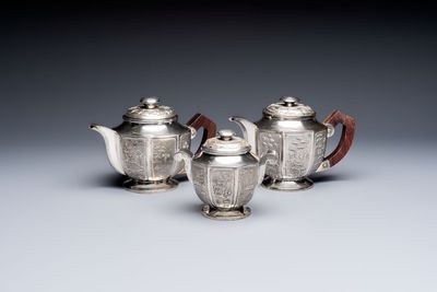 Two Vietnamese silver teapots and a covered sugar bowl, marked Donghung, ca. 1900