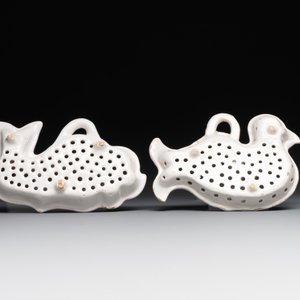 Two white-glazed pottery strainers in the shape of a dove and a whale, France, 18th C. — photo 2