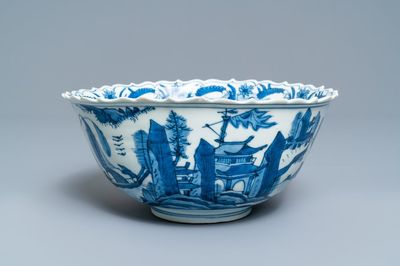 Un bol en porcelaine de Chine en bleu et blanc à décor d'un paysage au pagode, Wanli