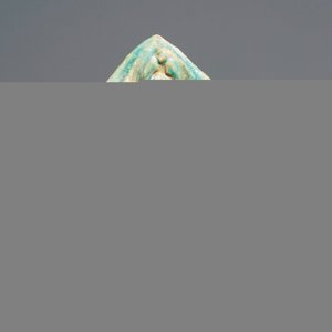 Un carreau à fond turquoise à décor en relief, Kashan, Iran, 12/13ème — photo 1