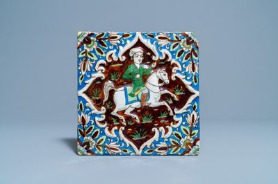 Un carreau polychrome à décor d'un prince sur cheval, art qajar, Iran, 19ème