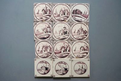 Un ensemble de 12 carreaux en Delft manganèse aux décors de paysages du 18/19ème siècle