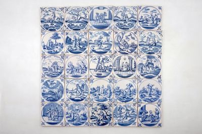 Un ensemble de 25 carreaux en faïence de Delft bleu et blanc aux sujets religieux, 18ème