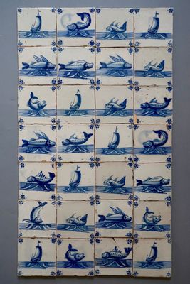 Un ensemble de 28 carreaux de Delft en bleu et blanc au scènes maritimes, atelier de Pulinckx, Bruges