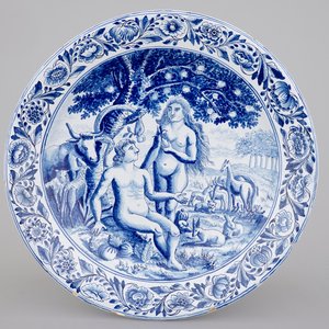 Un grand plat en faïence de Makkum au décor d'Adam et Eve, Frise, 19ème — photo 1