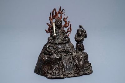 Un groupe en bronze laqué, doré et peint, Chine, Ming