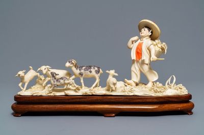 Un groupe en ivoire polychrome figurant un berger, Chine, vers 1940
