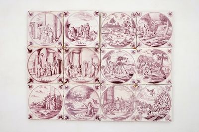 Un lot de 12 carreaux religieux en faïence de Delft manganèse avec oeillets, 18ème