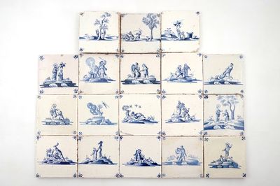 Un lot de 18 carreaux religieux en faïence de Delft bleu et blanc, 17/18ème