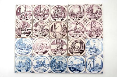 Un lot de 20 carreaux religieux en faïence de Delft bleu et blanc et manganèse, Utrecht, 18ème