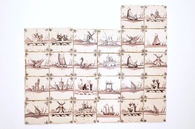 Un lot de 26 carreaux aux paysages en faïence de Delft manganèse, 18/19ème