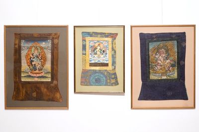 Un lot de trois thangkas, Tibet ou Népal, 19/20ème