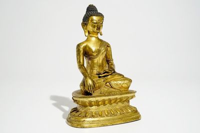 Un modèle de Bouddha en bronze doré, Chine, 18/19ème