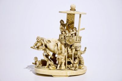 Un okimono en ivoire figurant des garçons jouant sur un éléphant, Japon, Meiji, 19ème, signé