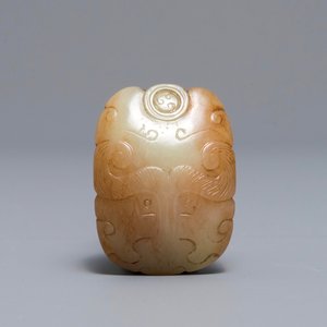 Un pendentif en jade rouille à inscription 'Charme du tigre', 19/20ème — photo 1